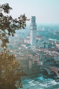 Blue hours in verona centre, italy. panoramic view from above on adige river and ponte pietra bridge