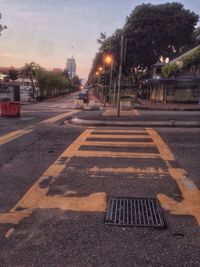 View of city street at dusk