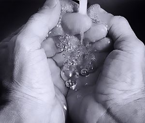 Close-up of hand holding ice cream