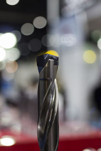 Close-up of wine bottles against blurred background