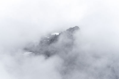 Low angle view of fog against sky