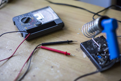 Close-up of electric meter on table