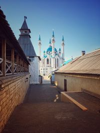 Kul sharif mosque in the kazan kremlin. a majestic white stone mosque under blue summer sky.