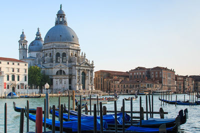 Santa maria della salute by grand canal against sky