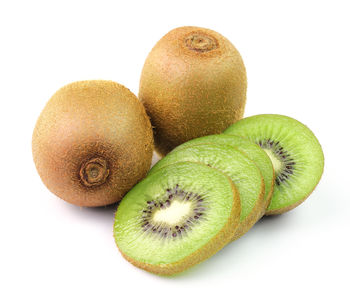 Close-up of fruits against white background