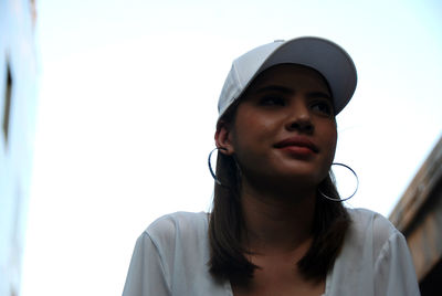 Portrait of young woman looking away