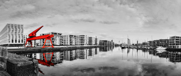 View of buildings against cloudy sky