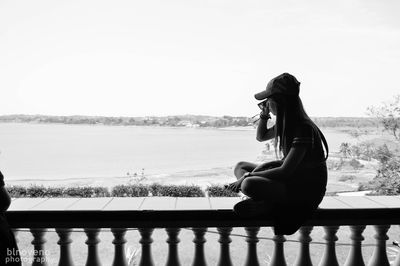 Man looking at river