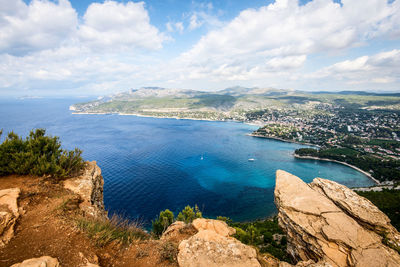 High angle view of bay against sky