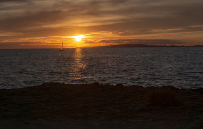 Scenic view of sea against sky during sunset