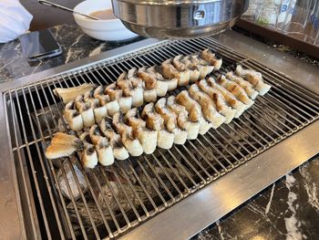 High angle view of food on barbecue grill