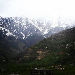 Scenic view of snow covered mountains