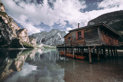 Panoramic view of lake and buildings against sky