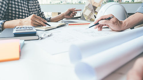 Group of people working on table