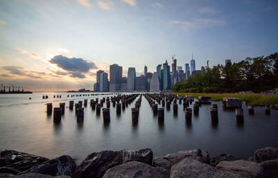 Panoramic view of sea and buildings against sky