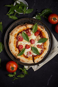 High angle view of pizza on table