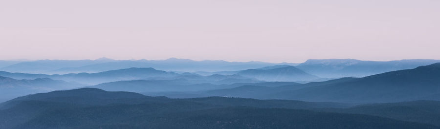 Scenic view of mountains against sky during sunset