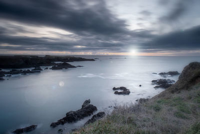 Scenic view of sea against sky during sunset