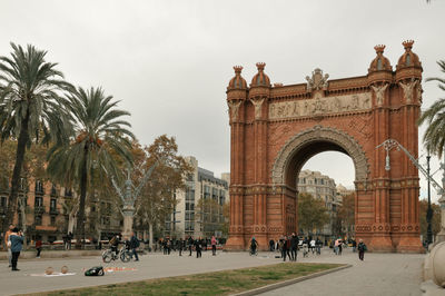 People in front of historical building