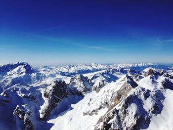 Scenic view of snow covered mountains