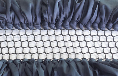 High angle view of piano on bed