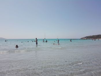 Scenic view of beach against clear sky