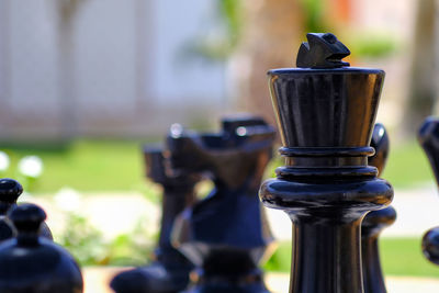 Close-up of chess piece outdoors