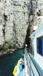 Scenic view of sea against mountain