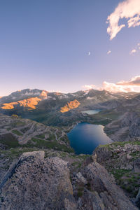 Scenic view of lake against sky during sunset