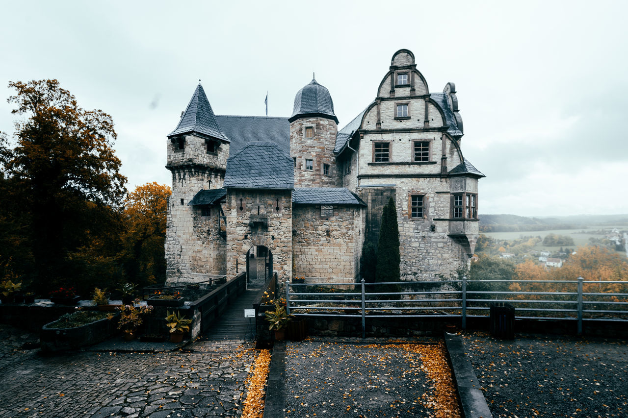 architecture, built structure, building exterior, sky, travel destinations, no people, tree, outdoors, city, water, day