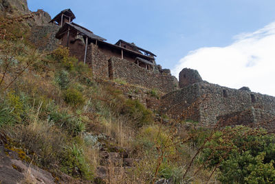 Low angle view of old building against sky