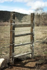 Old wooden structure on field