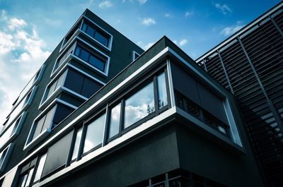 Low angle view of modern building against sky