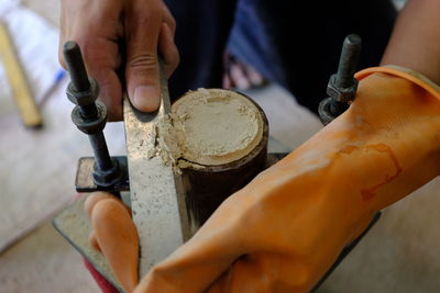 Cropped image of man working in workshop