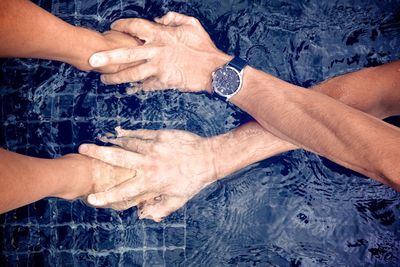 Close-up of people in swimming pool