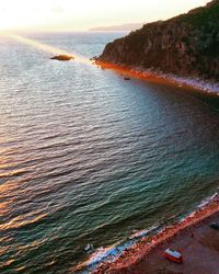 High angle view of sea against sky during sunset