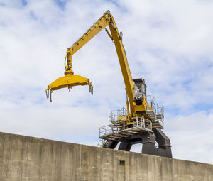 Low angle view of crane at construction site