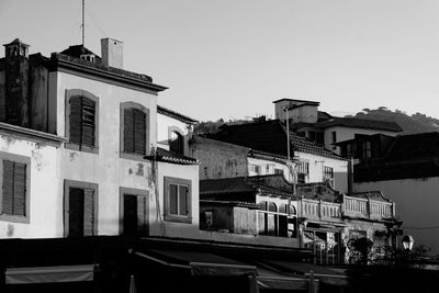 Low angle view of buildings against clear sky