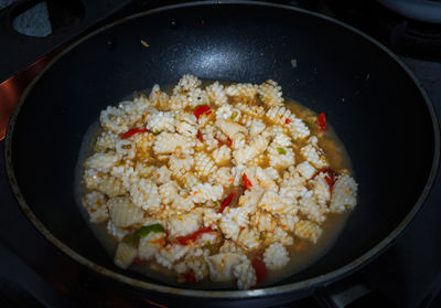 High angle view of meat in cooking pan