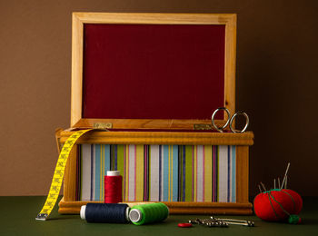 Close-up of multi colored pencils on table