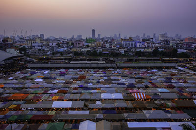 High angle view of buildings against sky at sunset