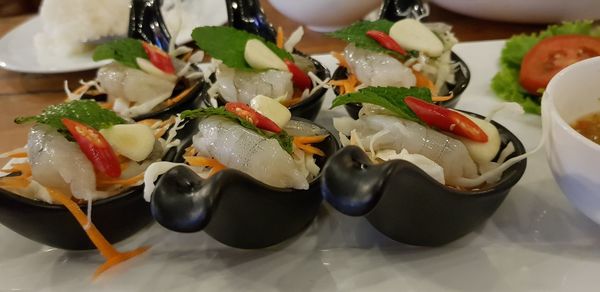 High angle view of fruits in plate on table