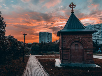 Exterior of building against sky during sunset
