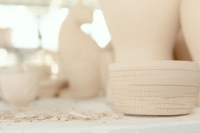 Close-up of coffee cup on table