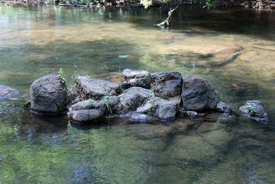 Reflection of rocks in lake