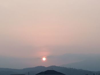 Scenic view of silhouette landscape against sky during sunset