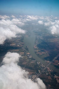 Aerial view of cityscape against sky