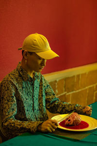 Man having food at table