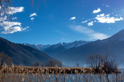 Scenic view of snowcapped mountains against sky