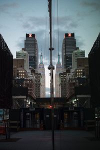 Modern buildings in city against sky